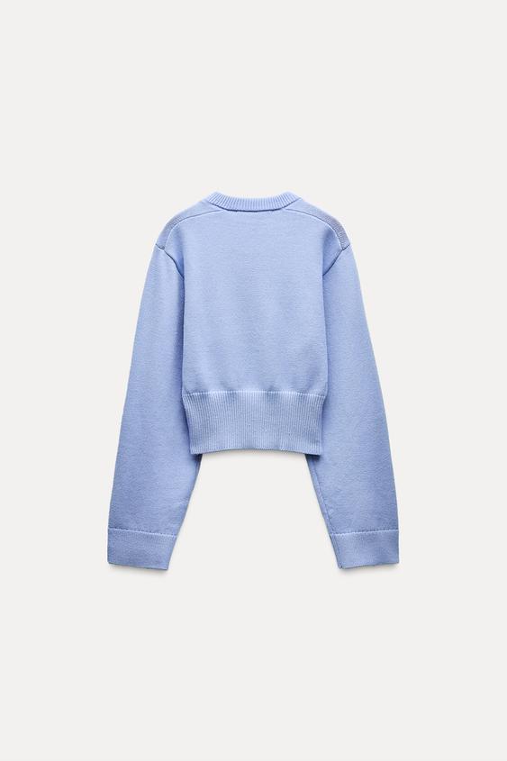 Kurzer Strickpullover mit weiten Ärmeln